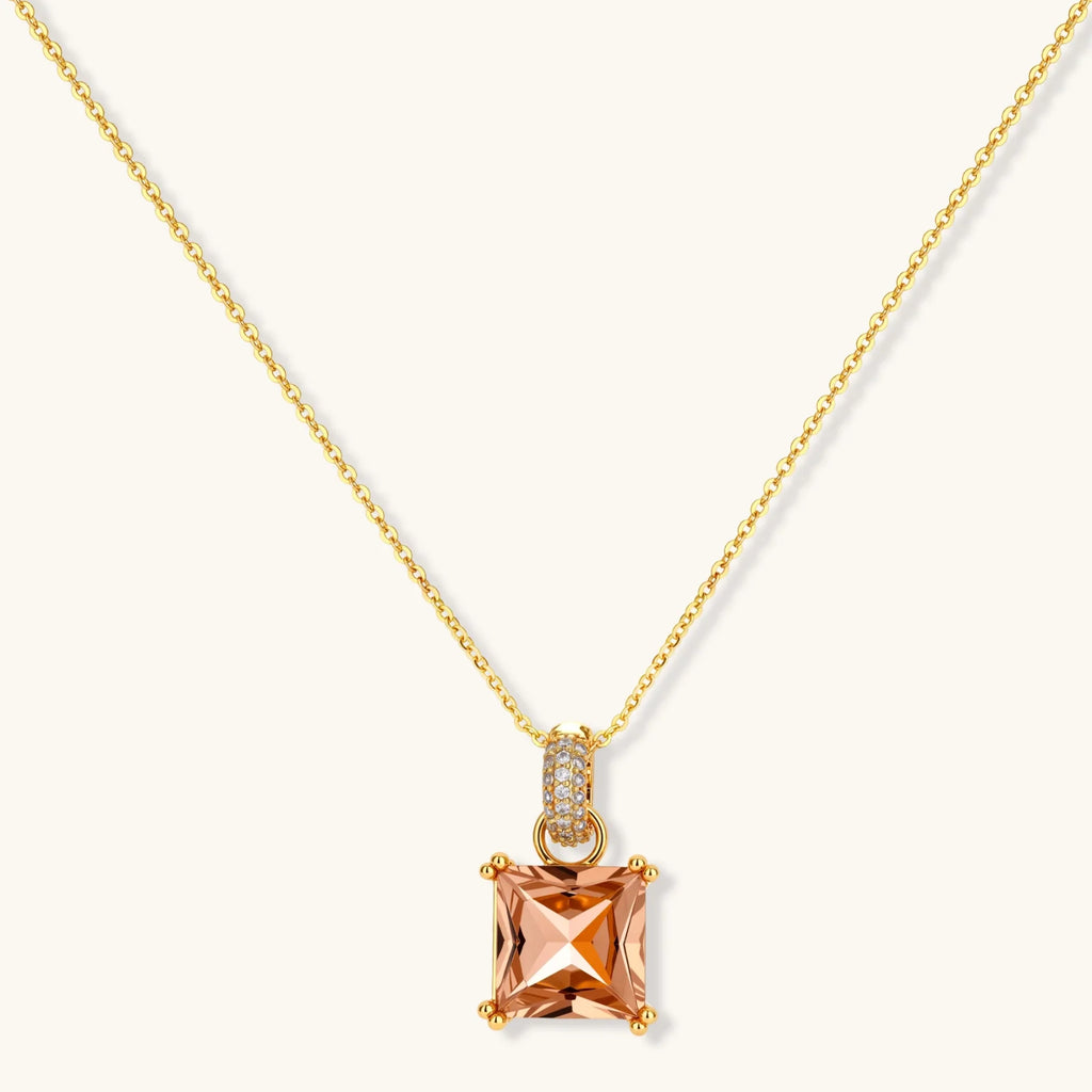 14K gold plated jewelry set featuring square champagne CZ stones with sparkling huggie earrings on cream background.