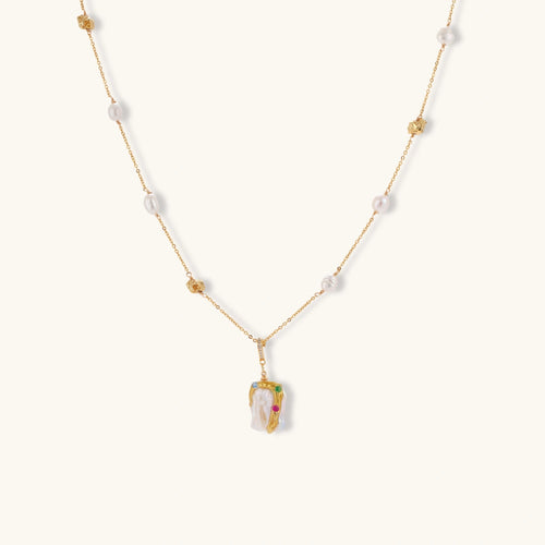 Delicate 18k gold-plated chain with baroque pearls and colorful enamel pendant featuring blue, pink accents on cream background.